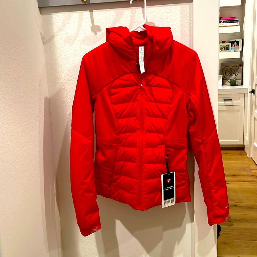 Brand new (never worn) women’s size 6 Lululemon Down For It All Red jacket .